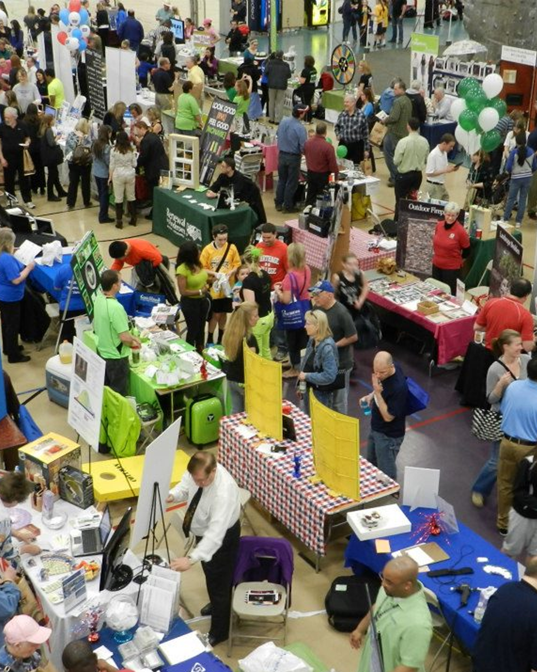 Attendees at the GLMV Extreme Block Party Family Expo and Taste of the Towns visiting booths