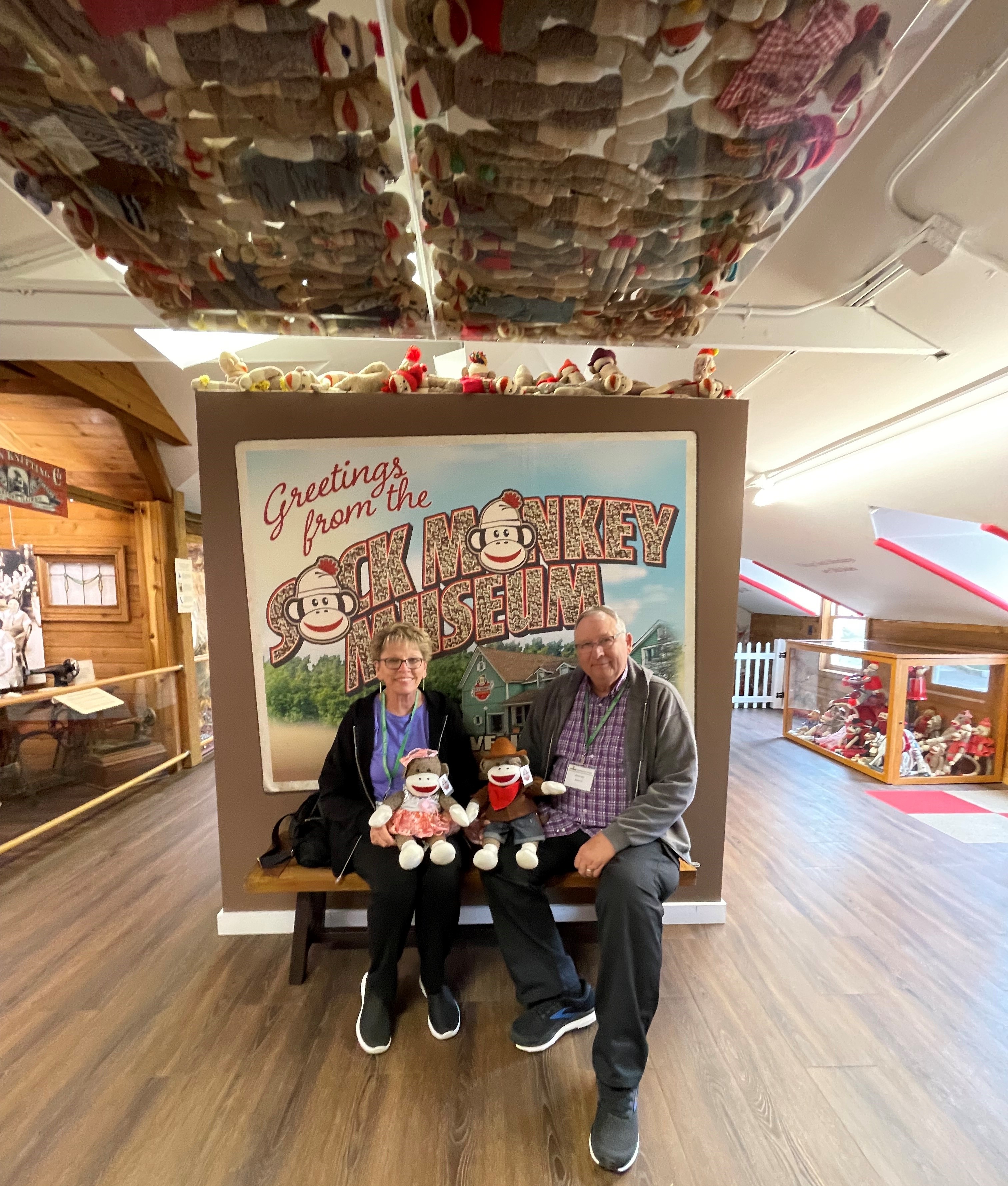 Sock monkey couple with sign