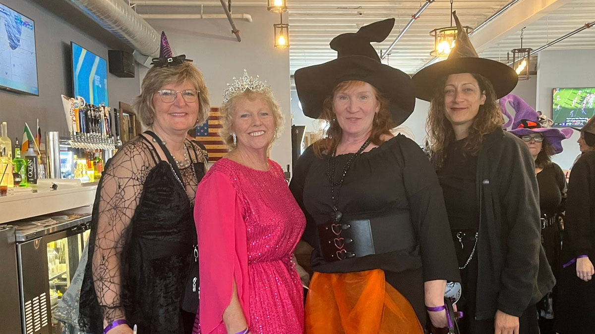 Women dressed as witches for the wine walk in Antioch
